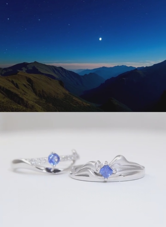 The finished custom wedding bands: D and M, moon, stars, and mountains joined together.