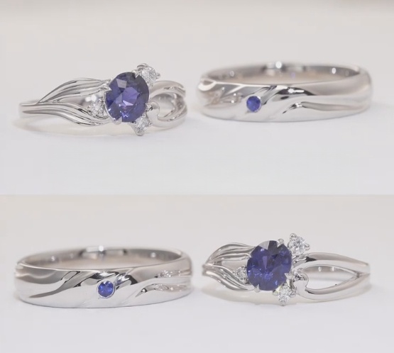 Finished 18K gold rings with wave lines, scattered diamonds, and a secret fishtail accent.