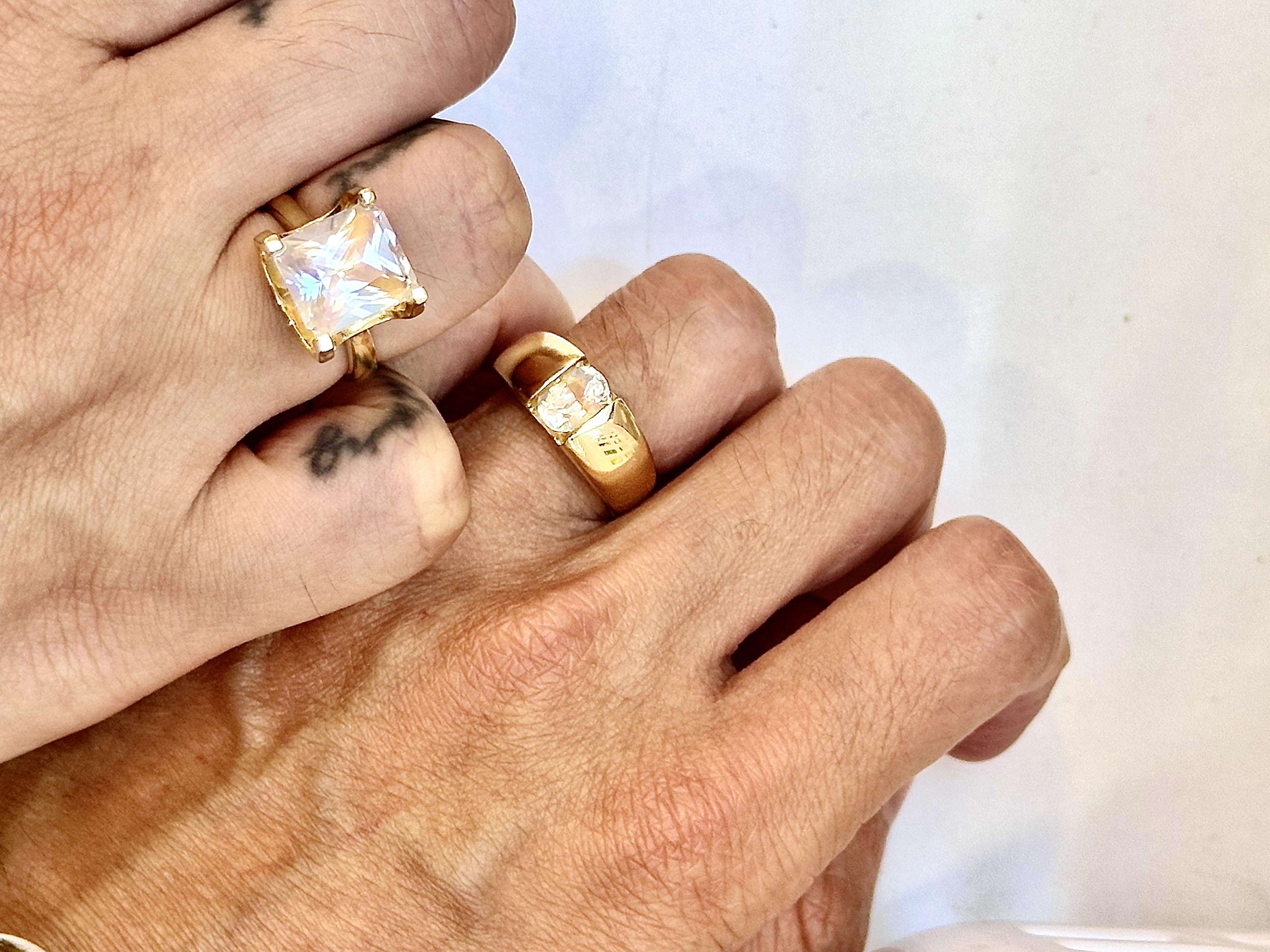 Couple exchanging moonstone engagement ring