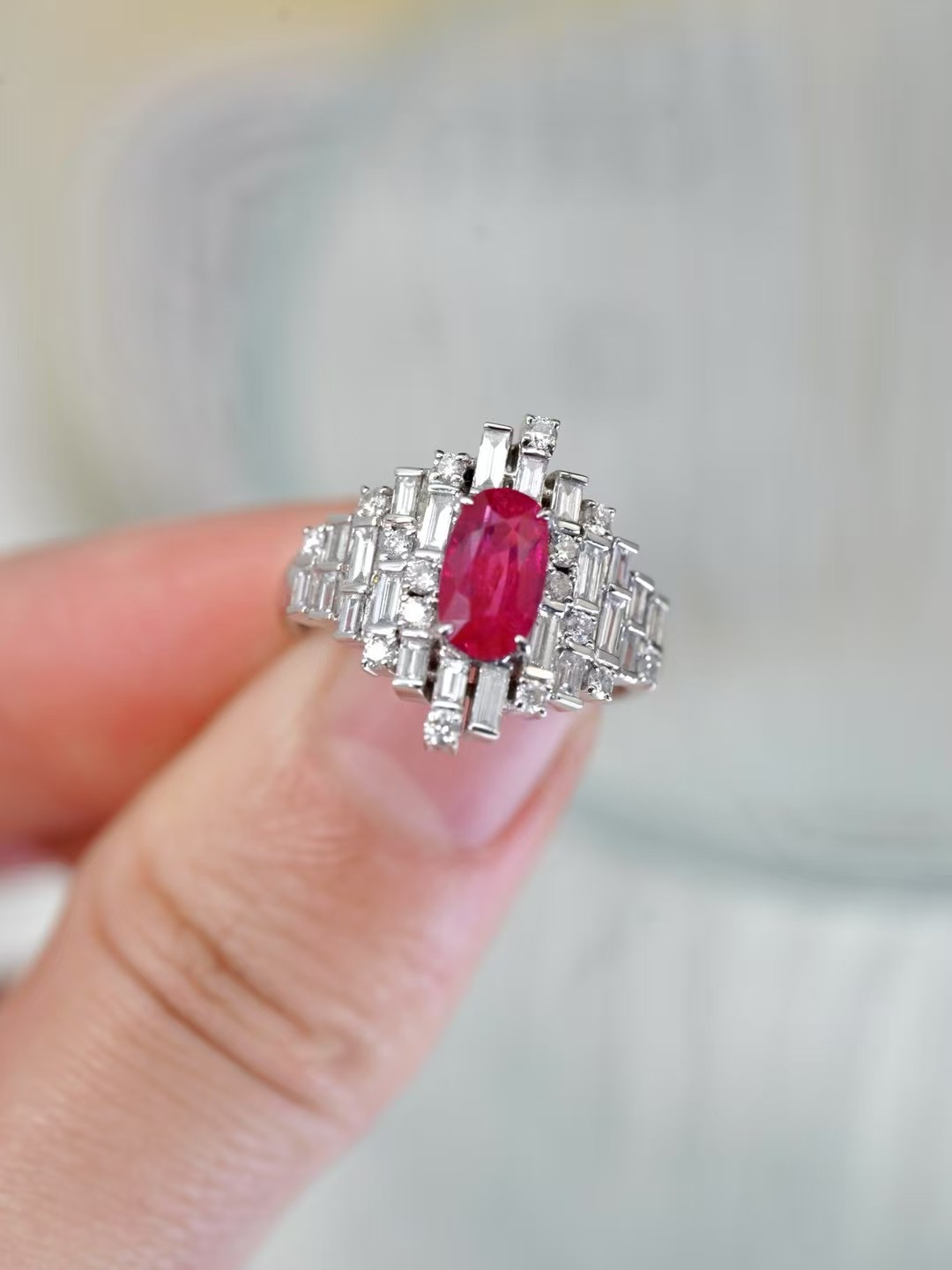 Oval Ruby Ring with Baguette Diamonds